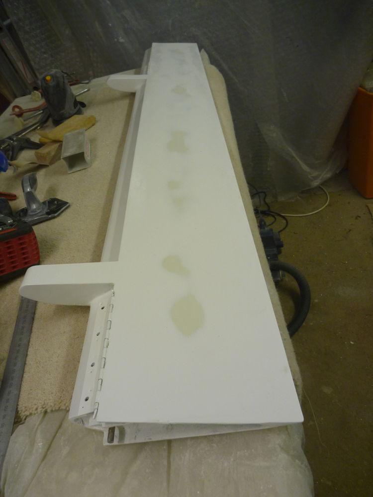 sanding paint and filler off port aileron