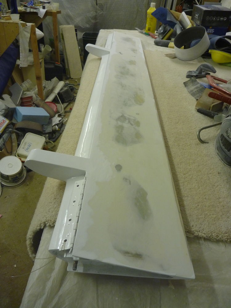 sanding paint and filler off port aileron