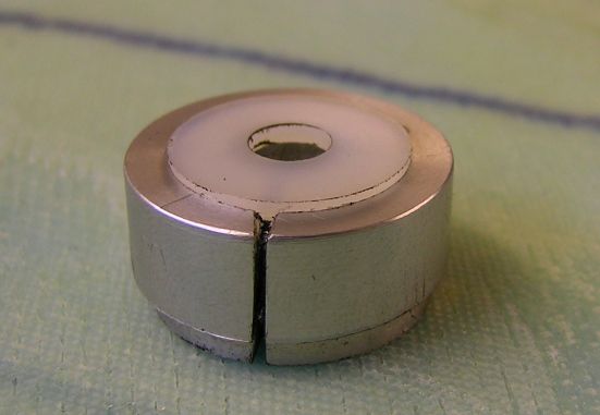 Holding device for outrigger mod washer